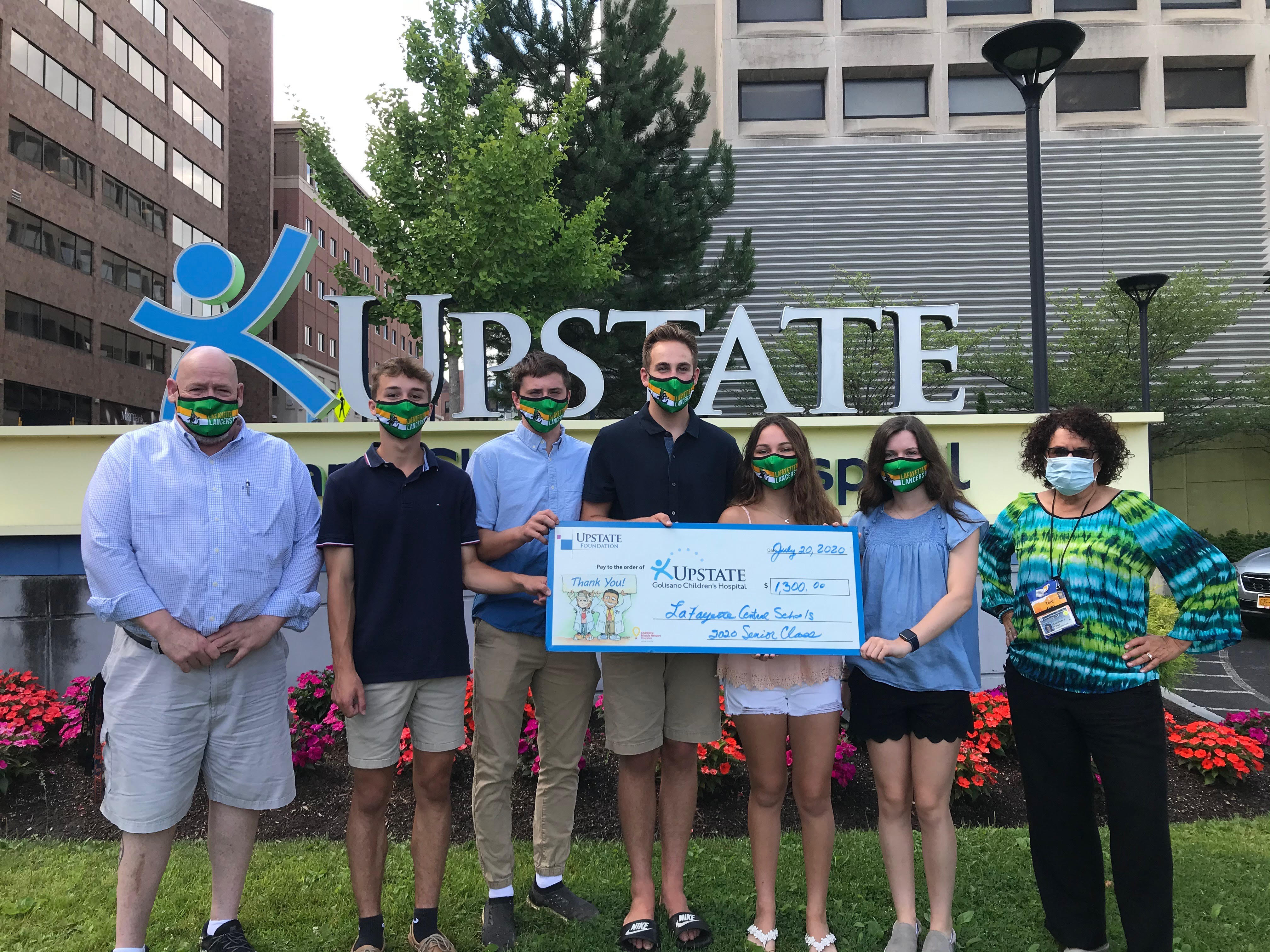 class of 2020 donates check to golisano children's hospital