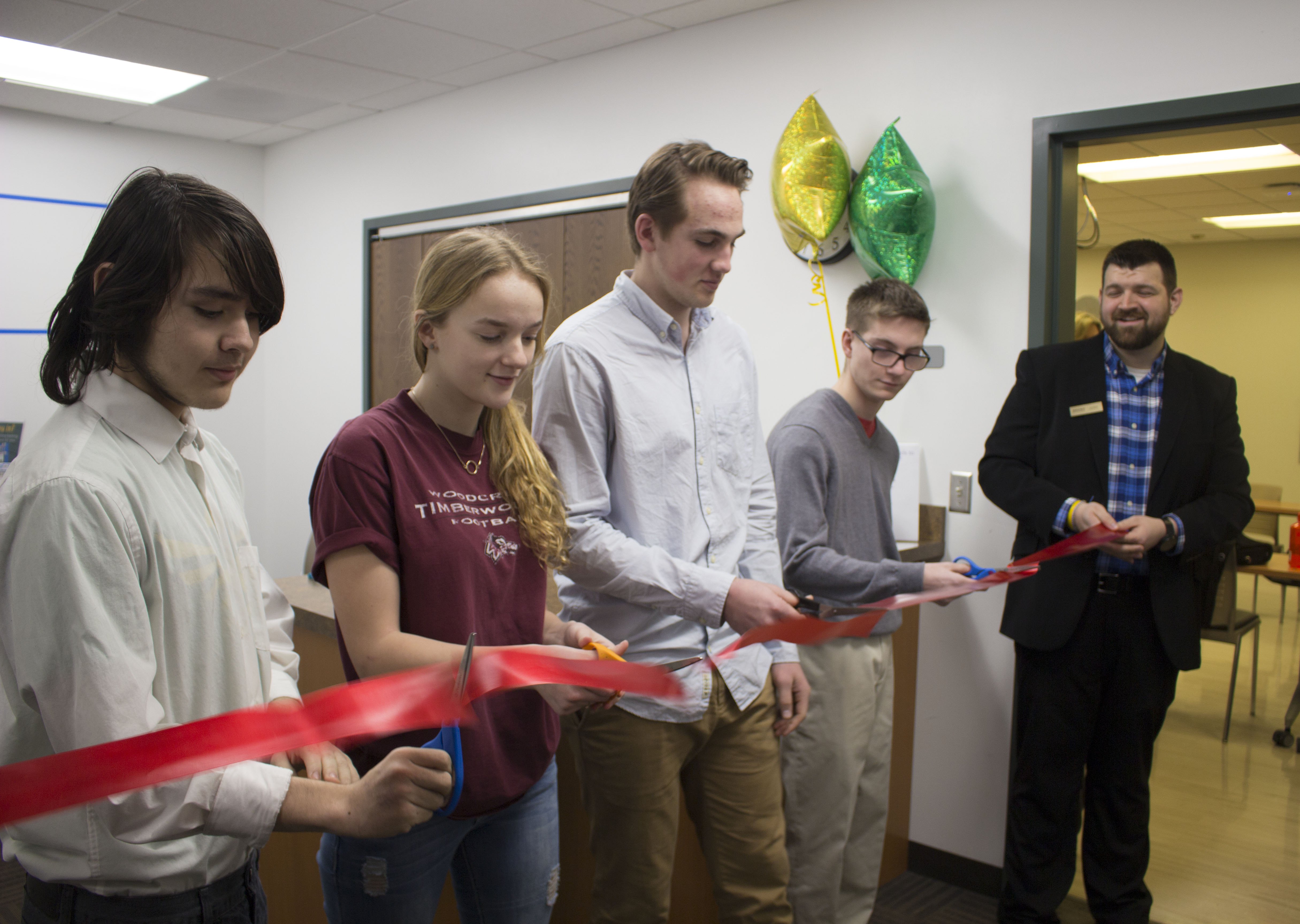 students cut ribbon on new SECNY lancer branch