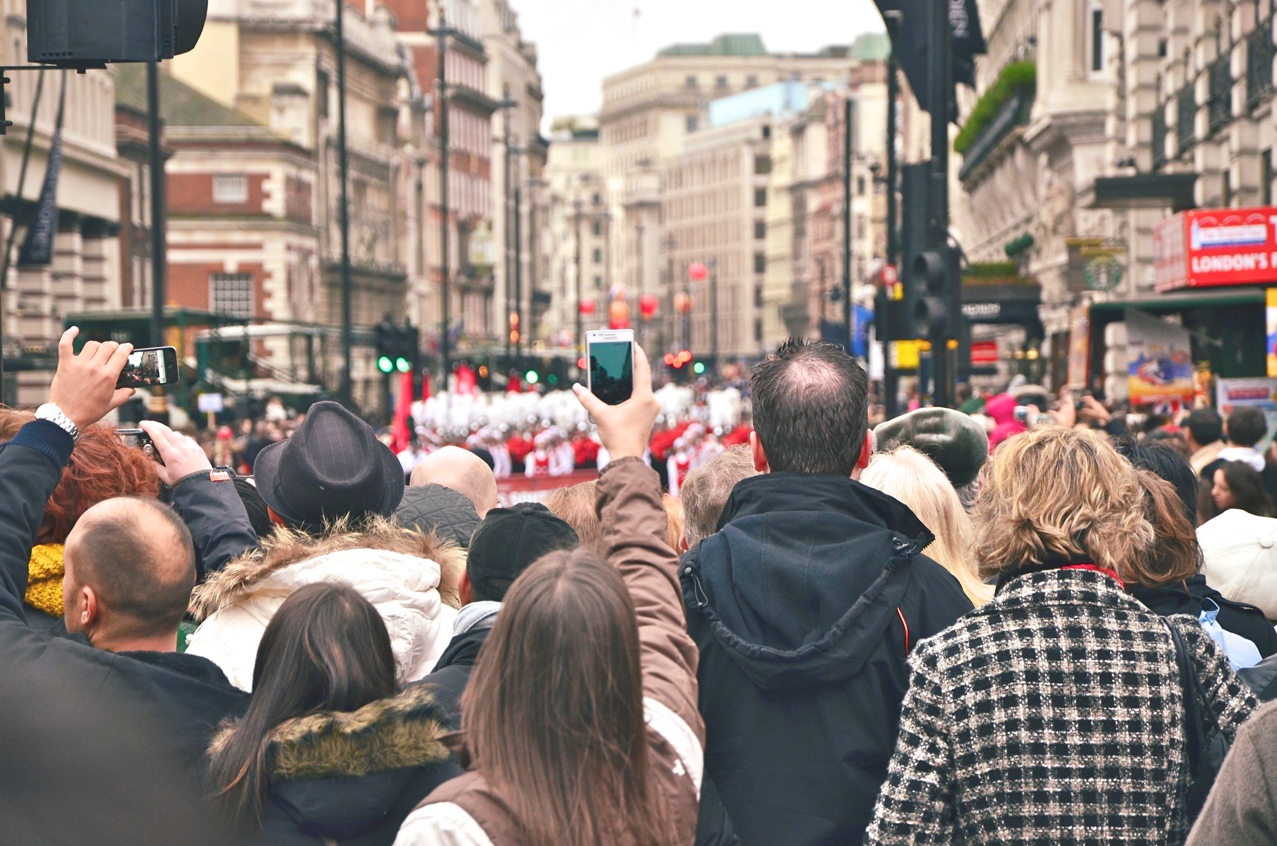 People cheering at a parade